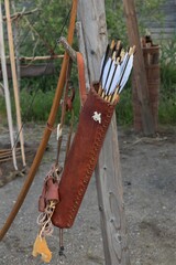 leather bow quiver with feathered arrows, viking longbow, archery