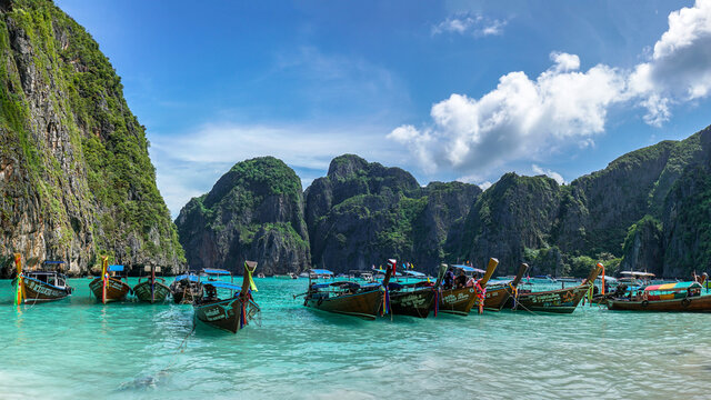 Longtail boats on the beach of Maya Bay, Krabi, Thailand