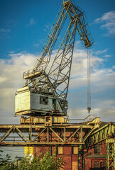 Fototapeta na wymiar old crane in the port