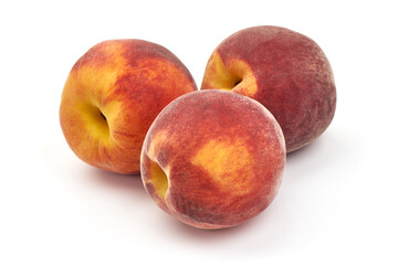 Fresh peaches, isolated on white background