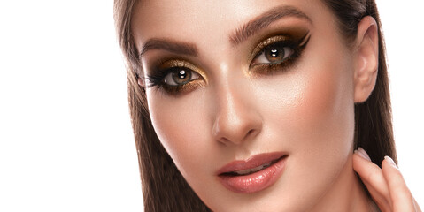 Beautiful girl with bright fashionable make-up and long thick hair. Beauty face.