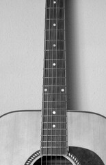 Close up, abstract details of stringed musical instruments including mandolins, guitars, and...