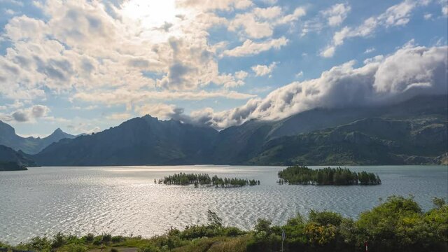 Timelapse of the passage of the clouds from the well-known most beautiful bench of Leon in the Ria&ntilde;o reservoir, Leon, Spain