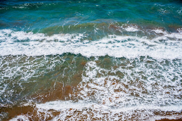
Different shots of the surf of a beach in summer in southern Spain