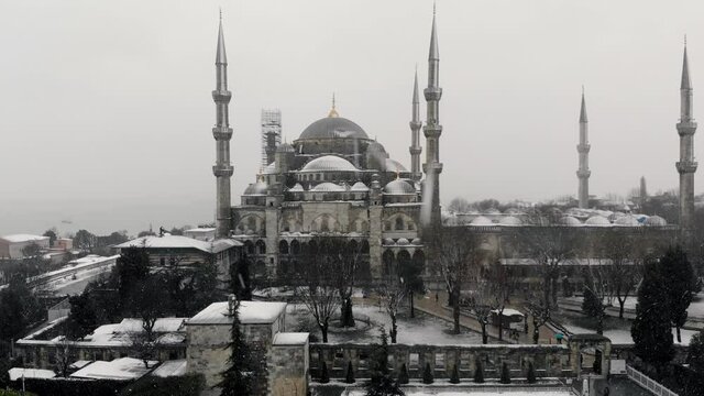 Aerial footage of Blue Mosque in winter time. Sultanahmet, Istanbul. Popular tourist destination. Сultural heritage 4K