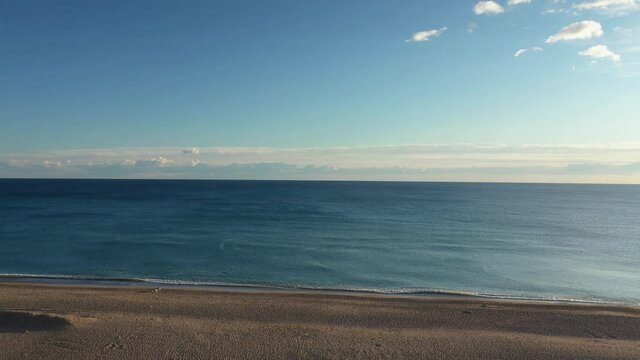 Meditteranean sea shore from the top. Beautiful natural landscape. Blue sky with clouds 