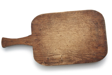 very old brown rectangular wooden kitchen cutting board with handle