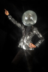 Mr disco ball wearing silver jacket dancing