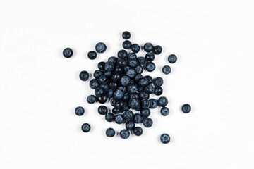 nature and healthy food concept. Top view of fresh blueberries isolated on white