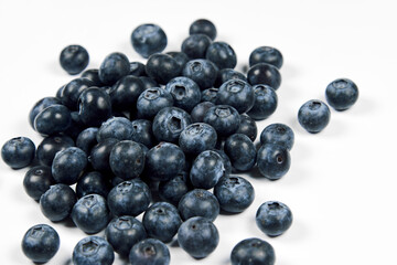 nature and healthy food concept. Top view of fresh blueberries isolated on white