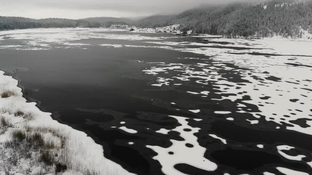 Aerial footage of frozen lake in Abant national Park. Natural winter landscape Bolu, Turkey. 