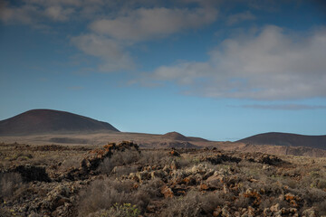 sunset clouds over mountains, Timanfaya National Park.