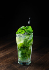 classic mojito cocktail on wooden background