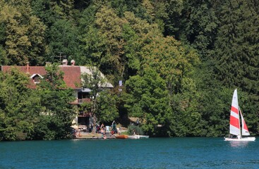 Sailing boat in the lake of Bled at the summer