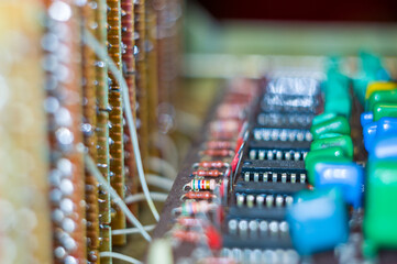 Vintage electronic circuit boards with radio parts and chips, close-up, macro photo