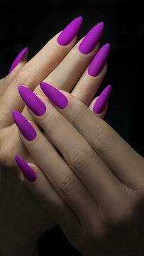 Art Manicure. Modern style violet Nails Polish. Violet long Nails on black background