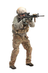 American ranger in military equipment and with a rifle aiming and shoots on a white background, portrait of a special forces soldier with weapons