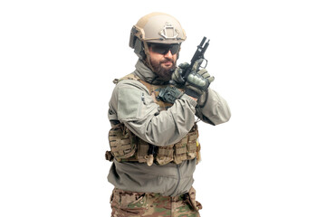 American ranger in military equipment with a gun and knife on a white background, portrait of a special forces soldier with a weapon