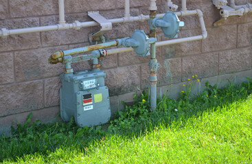 Naklejka premium Gas and Utility Meter Closeup Outdoors
