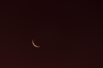 crescent moon observed during dusk in the southern hemisphere.