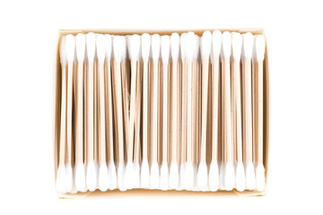 Close up of bamboo cotton sticks in eco paper box on blue background