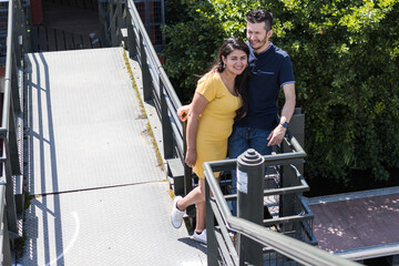 couple of man and woman on a bridge