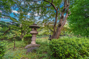 Wide angle view of Hibiya Park or Hibiya Koen (日比谷公園). Urban public park located in Tokyo, Japan