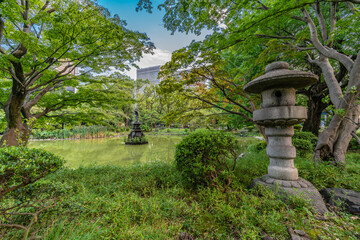 Wide angle view of Hibiya Park or Hibiya Koen (日比谷公園). Urban public park located in Tokyo, Japan 