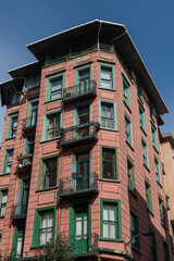 Old wooden apartment on the blue sky.