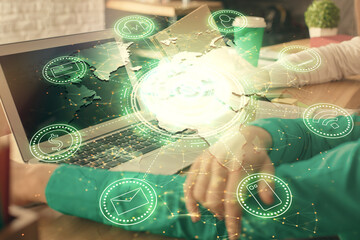 Double exposure of man and woman working together and social network theme hologram drawing. People connection concept. Computer background.