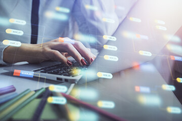 Multi exposure of woman hands working on computer and data theme hologram drawing. Tech concept.