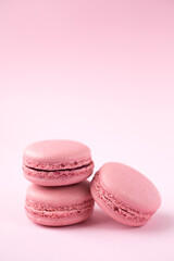 Pink macarons on pink background