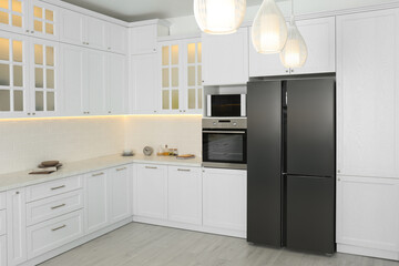 Beautiful kitchen interior with new stylish furniture