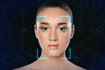 Facial recognition system. Woman with scanner frame and digital biometric grid on dark background