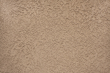 A Stucco Wall Texture light beige background