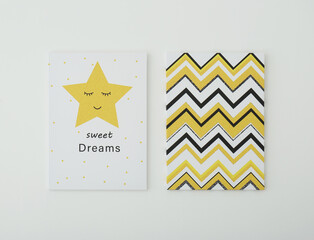 Adorable pictures of zigzag pattern and star with words SWEET DREAMS on white wall. Children's room...