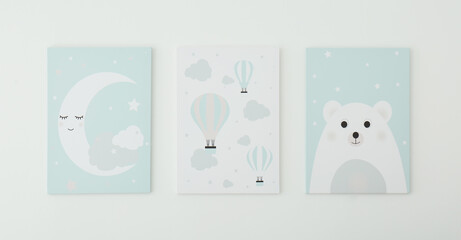 Different cute pictures on white wall. Children's room interior elements