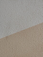 Plaster. Walls of plaster. Light dark background or backdrop in two colors. Light two-tone...