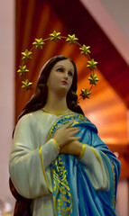 Close up of Statue of Our lady of grace virgin Mary in the church, Thailand. selective focus.