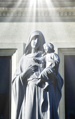 Naklejka premium Statue of Our lady and child Jesus in catholic church, Thailand. selective focus.
