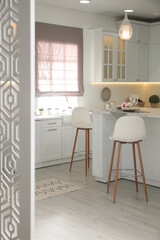 Fototapeta premium Modern kitchen with stylish furniture. Interior design