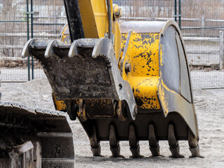 detail of a heavy steel excavator bucket from a construction digger