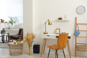 Living room and workplace in spacious apartment. Interior design