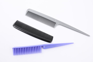 a variety of combs useful for a home haircut isolated on white