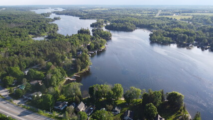 Aerial View of Beautiful Canadian Outdoor Landscape in Kawartha Lakes, Ontario during Clear Summer Weather 