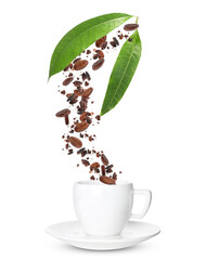 Cocoa beans and leaves falling into cup on white background