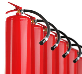 Set with fire extinguishers on white background
