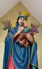 Obraz premium Closeup of Our lady of perpetual help statue virgin Mary with Child Jesus in the church, Thailand. selective focus.