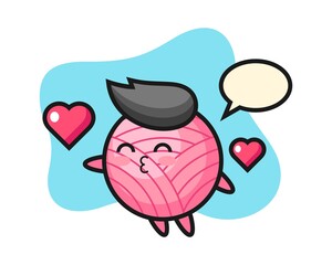 Yarn ball cartoon with kissing gesture