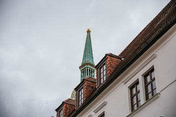 Fototapeta na wymiar Bratislava church tower with a crown on the tip.